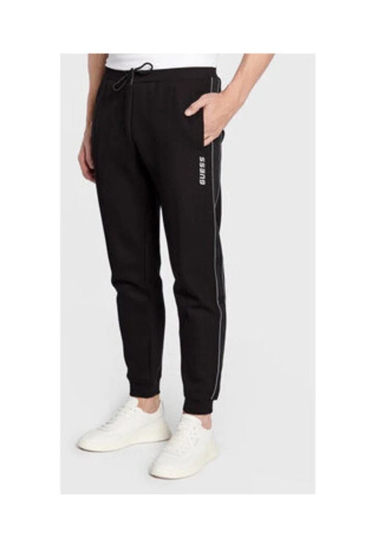 Pantaloni de trening cu buzunare oblice,