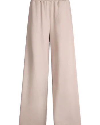 Pantaloni cu croiala ampla si logo metalic, Bej