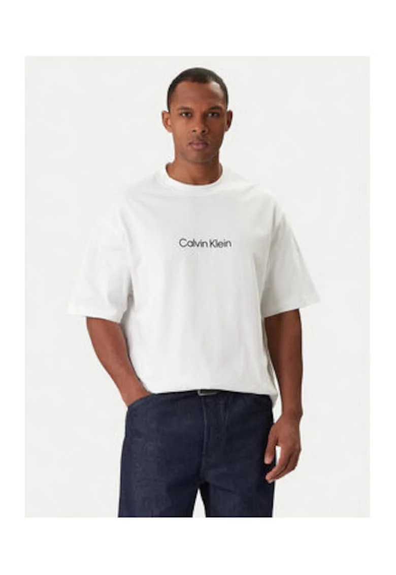 Tricou uni cu maneci cazute si imprimeu pe piept,