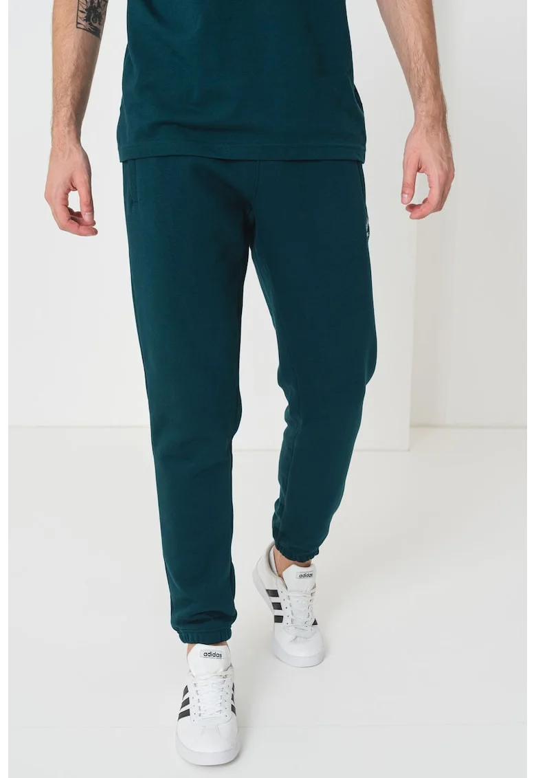 Pantaloni de trening slim fit cu buzunare Trefoil Essentials, Verde englez