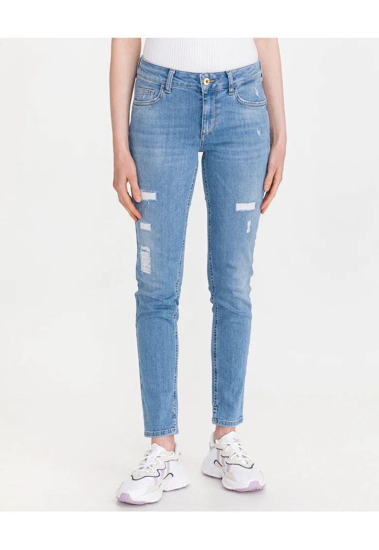 Blugi skinny cu aspect uzat,