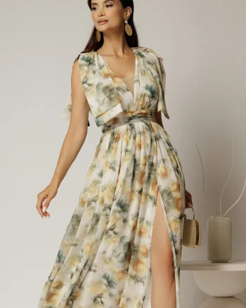 Rochie DY Fashion din voal creponat cu imprimeuri galbene si funde ample pe umeri
