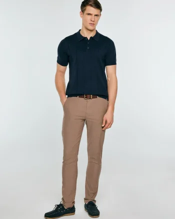 Tricou polo uni din bumbac .