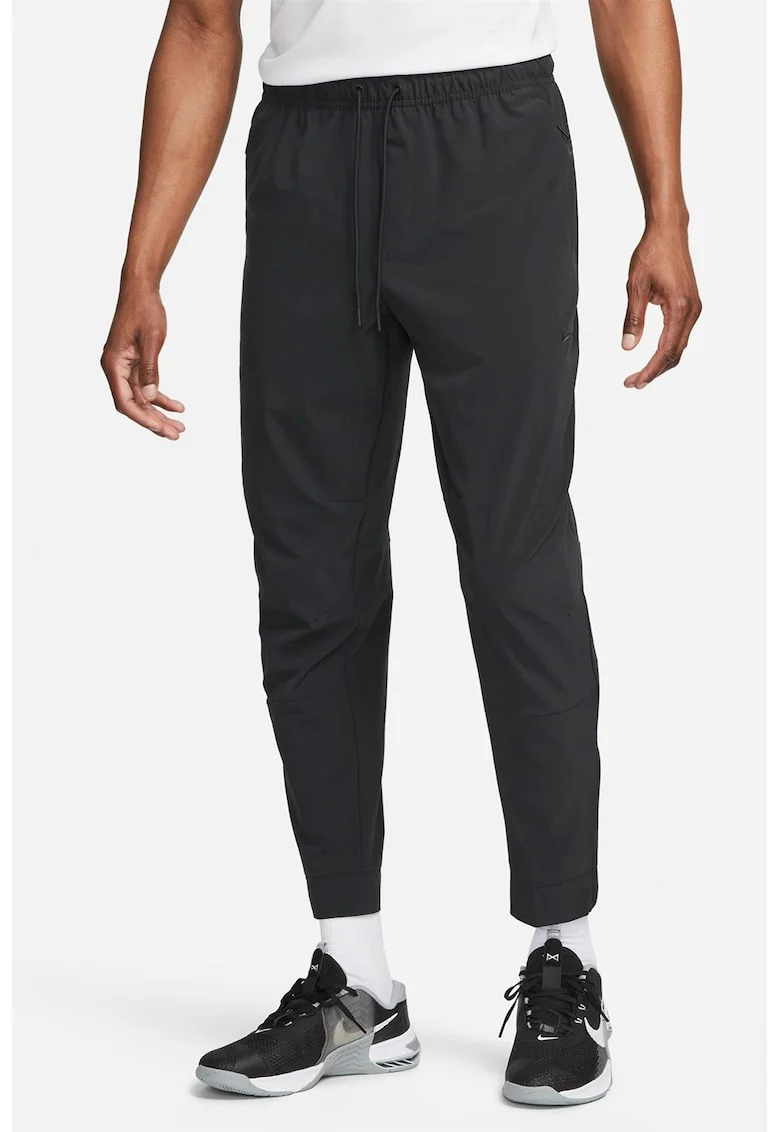 Pantaloni conici cu tehnologie Dri-FIT si slituri cu fermoar Unlimited, Negru