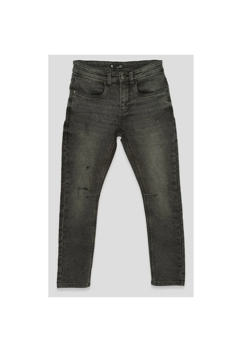 Blugi rupti slim fit usor decolorati,