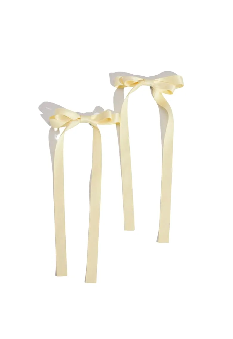Agrafe de par elegante cu fundite din satin galben – Accesorii rafinate pentru fetite, ideale pentru orice ocazie