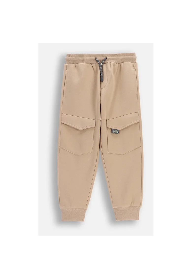 Pantaloni  bej, Bej