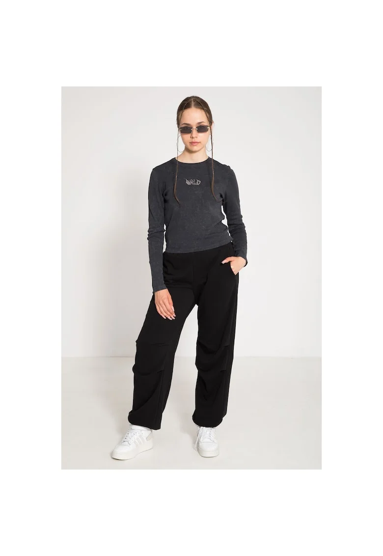 Pantaloni cu croiala ampla si talie elastica