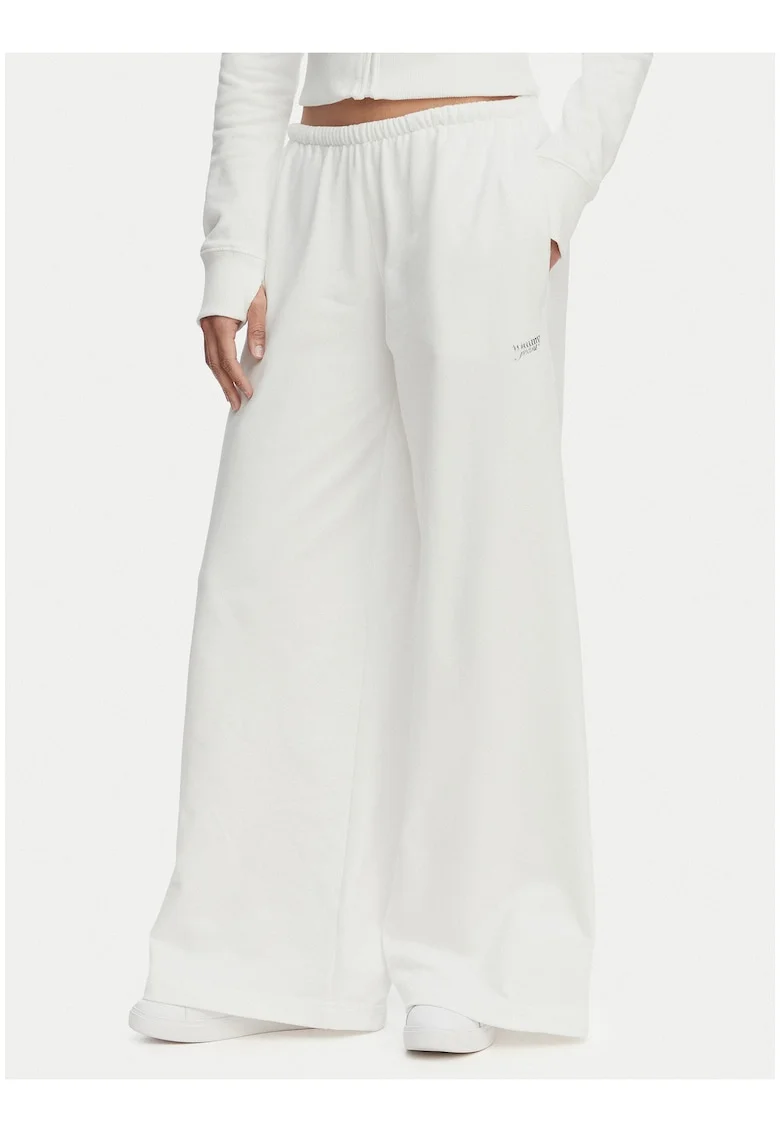 Pantaloni de trening uni cu croiala ampla