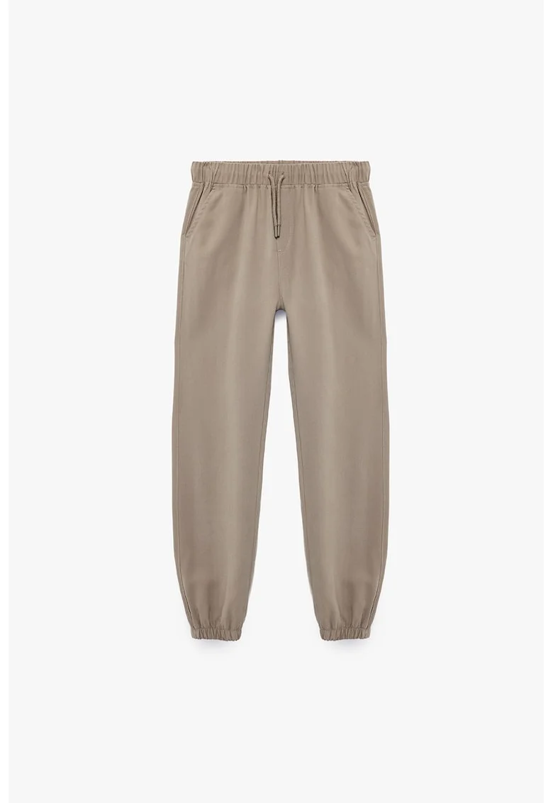 Pantaloni de trening cu croiala conica si terminatii elastice, Bej