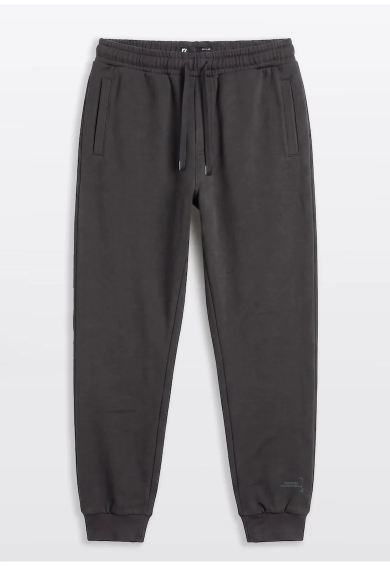 Pantaloni de trening conici