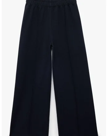 Pantaloni cu croiala ampla si model uni, Bleumarin