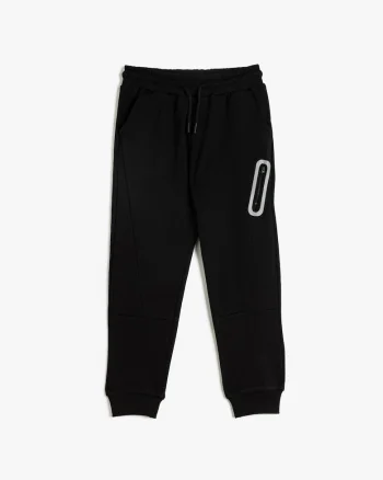 Pantaloni de trening cu design grafic
