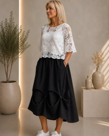 Fusta ampla din jerseu cu drapaj sculptural si talie elastica, neagra
