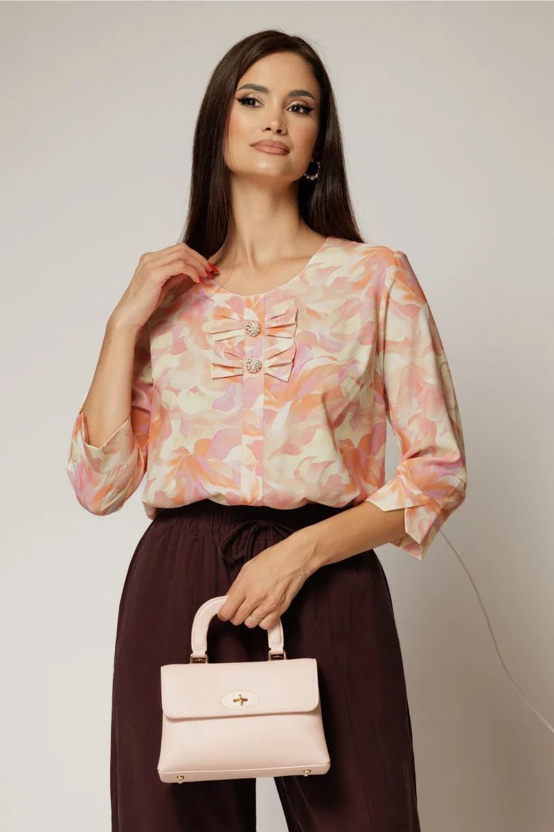 Bluza cu imprimeuri galbene si orange cu funde la decolteu si nasturi decorativi